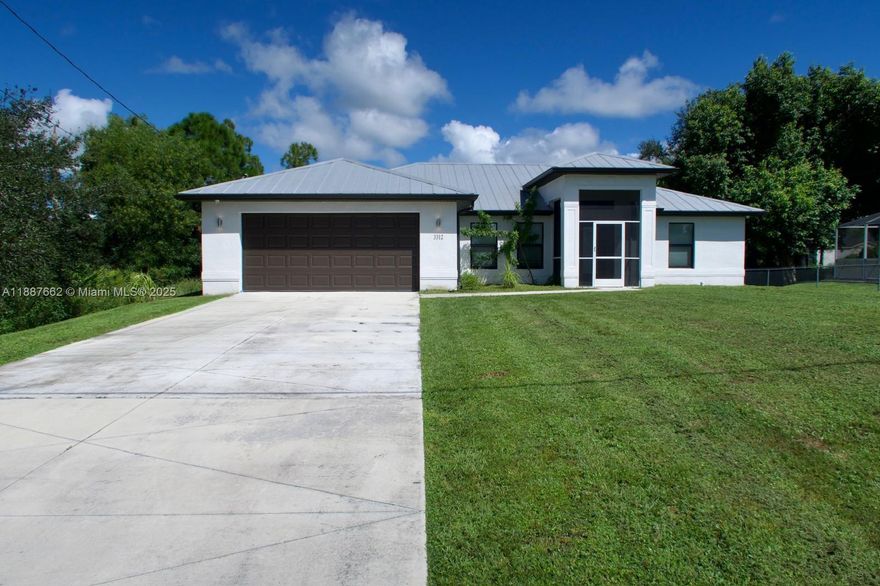 Experience elevated living in Lehigh Acres. This exquisite single-story residence showcases superior craftsmanship with solid block and stucco construction, an aluminum roof, and an oversized 2-car garage. Set on a serene ¼-acre lot, it offers both privacy and freedom — no HOA, no restrictions. The open-concept design blends sophistication and comfort, featuring bright, airy spaces perfect for modern living. Ideally located near top schools, shopping, and leisure destinations. A remarkable opportunity to own a home that balances elegance, value, and lifestyle.
Information deemed reliable but must be verified by buyer and agent.