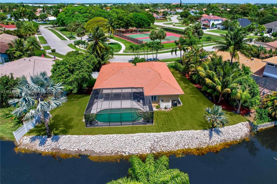 3 BDRMS, 2 FULL BTHS IN BOCA RATON, CLOSE TO EVERYTHING. CANAL FRONT SCREENED PATIO WITH POOL, INSIDE LAUNDRY ROOM & ATTACHED 2-CAR GARAGE. THE HOMEOWNER'S FEE IS $500 PER YEAR, ENJOY THE PARK WITH BBQ, TENNIS/PICKLE BALL COURTS & THE PLAYGROUND. OPEN FLOORPLAN YET DEFINED LIVING ROOM, DINING ROOM & FAMILY ROOM.  KITCHEN IS OPEN TO FAMILY ROOM & HAS WOOD CABINETS, STAINLESS STEEL APPLIANCES & GRANITE COUNTERTOPS. GREAT STORAGE & COUNTERTOP SPACE IN KITCHEN WITH EXTRA STORAGE IN THE LAUNDRY ROOM/PANTRY. THE PRIMARY BEDROOM HAS GOOD CLOSET SPACE & ACCESS TO THE POOL. THIS HOME HAS A NEW CENTRAL A/C & WATER HEATER. HURRICANE SHUTTERS FOR ALL WINDOWS AND DOORS. MINUTES FROM FRESH MARKET, WHOLE FOODS, TRADER JOES, TRI-RAIL STATION & OTHER GREAT SHOPPING. A RATED SCHOOLS  HOA IS $500 PER YEAR.