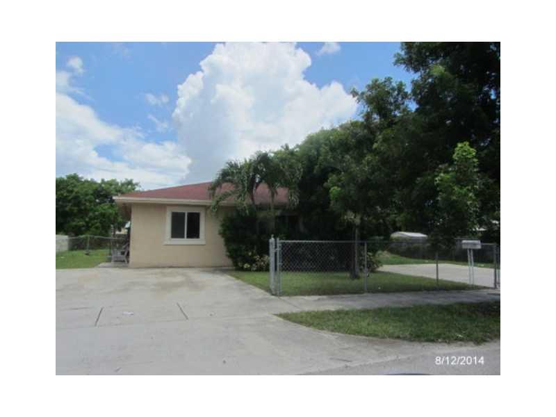 Full of potential and partially updated, 3 bedroom / 2 bathroom attached single family home centrally located in Miami Gardens. Property features thoroughly tiled floors, fenced patio, electric range and needs repairs. Property is lender owned, is being s old as-is, and U.S. Bank is making no representation or warranties.