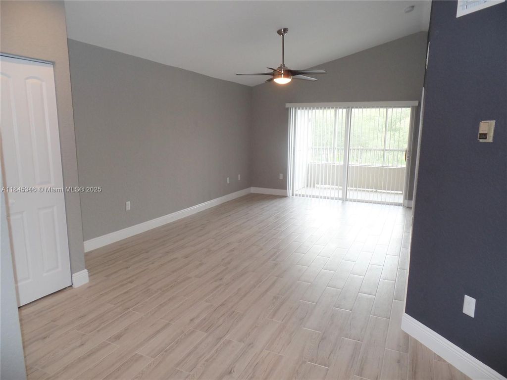 Photo of 2803 N Oakland Forest Dr #303, Oakland Park, FL 33309 (MLS # A11845346)