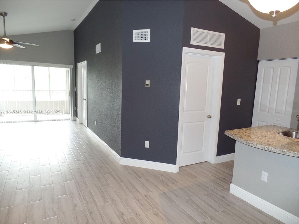 Photo of 2803 N Oakland Forest Dr #303, Oakland Park, FL 33309 (MLS # A11845346)