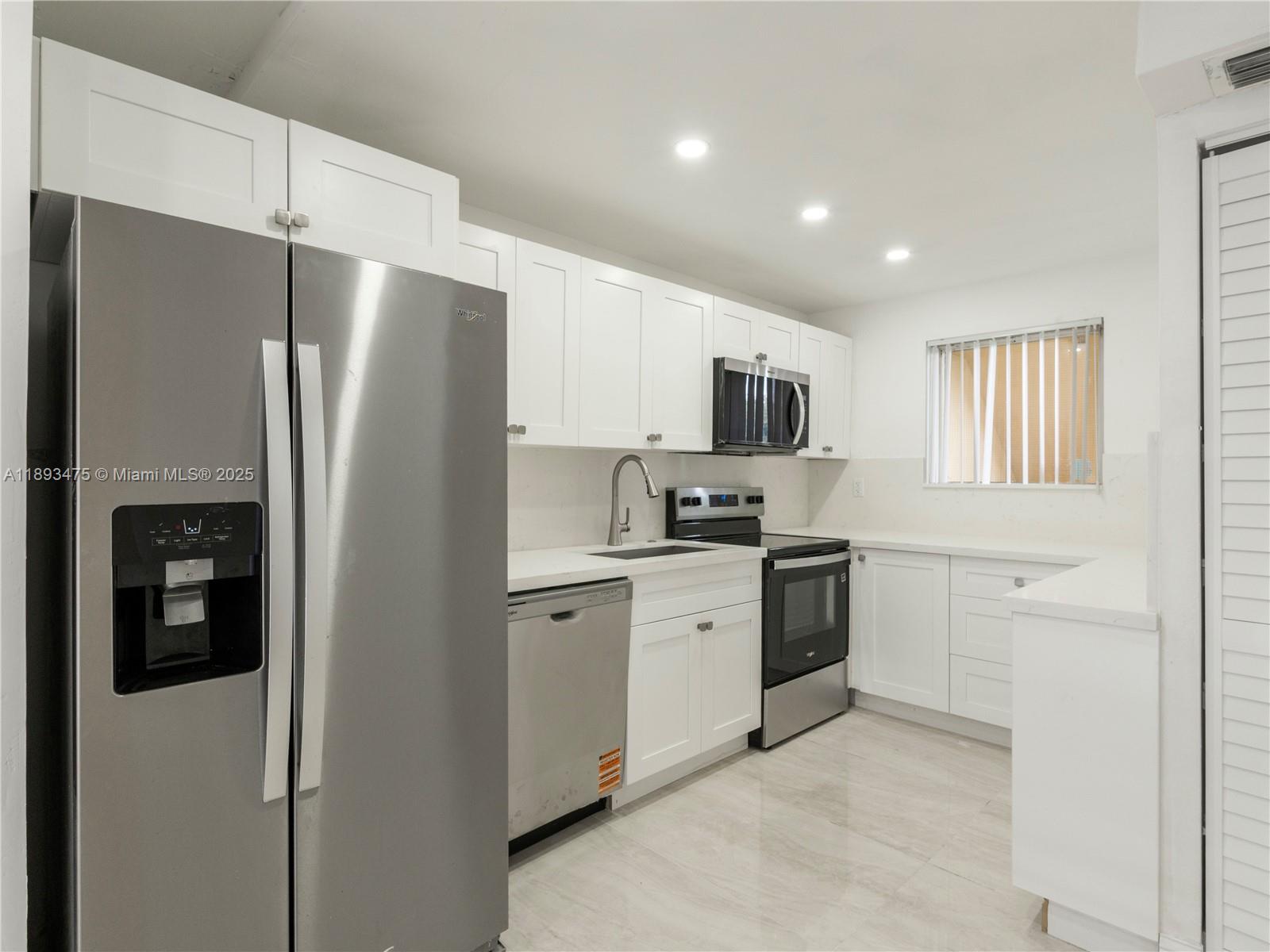 Step into this stunningly renovated 2-bedroom, 2-bathroom condo located in the highly sought-after Foxcroft community in Miramar. This modern residence boasts a brand-new contemporary kitchen featuring sleek quartz countertops, stainless steel appliances, soft-close white shaker cabinets, and recessed lighting that brightens the entire space.
Enjoy the open-concept layout with luxurious porcelain tile floors throughout, offering both elegance and durability. The spacious bedrooms provide ample closet space, while both bathrooms have been tastefully updated with modern fixtures, vanities, and tile work for a clean, fresh look.
The unit is located in a quiet and well-maintained building with secure entry, and comes with assigned parking.