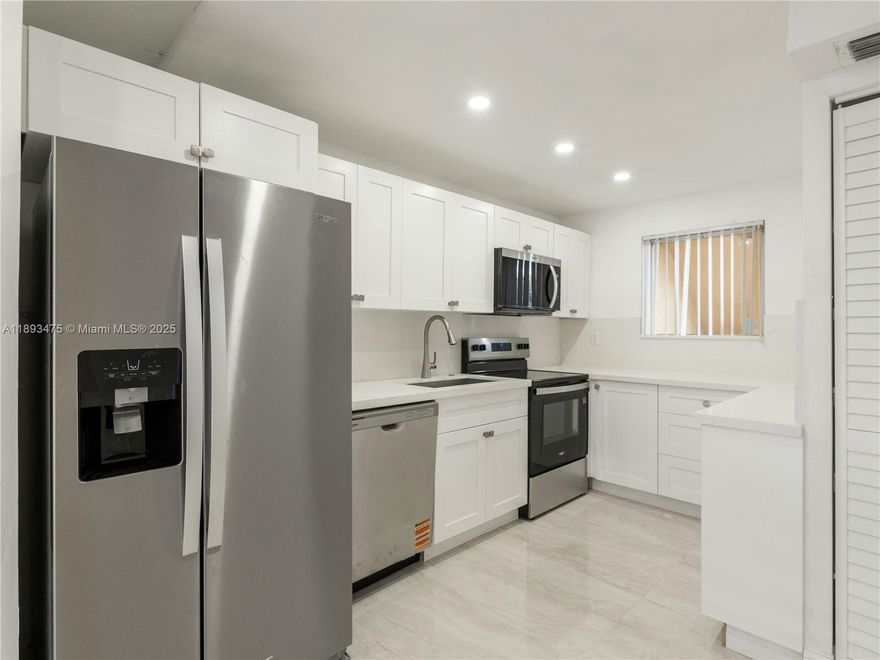 Step into this stunningly renovated 2-bedroom, 2-bathroom condo located in the highly sought-after Foxcroft community in Miramar. This modern residence boasts a brand-new contemporary kitchen featuring sleek quartz countertops, stainless steel appliances, soft-close white shaker cabinets, and recessed lighting that brightens the entire space.

Enjoy the open-concept layout with luxurious porcelain tile floors throughout, offering both elegance and durability. The spacious bedrooms provide ample closet space, while both bathrooms have been tastefully updated with modern fixtures, vanities, and tile work for a clean, fresh look.

 The unit is located in a quiet and well-maintained building with secure entry, and comes with assigned parking.