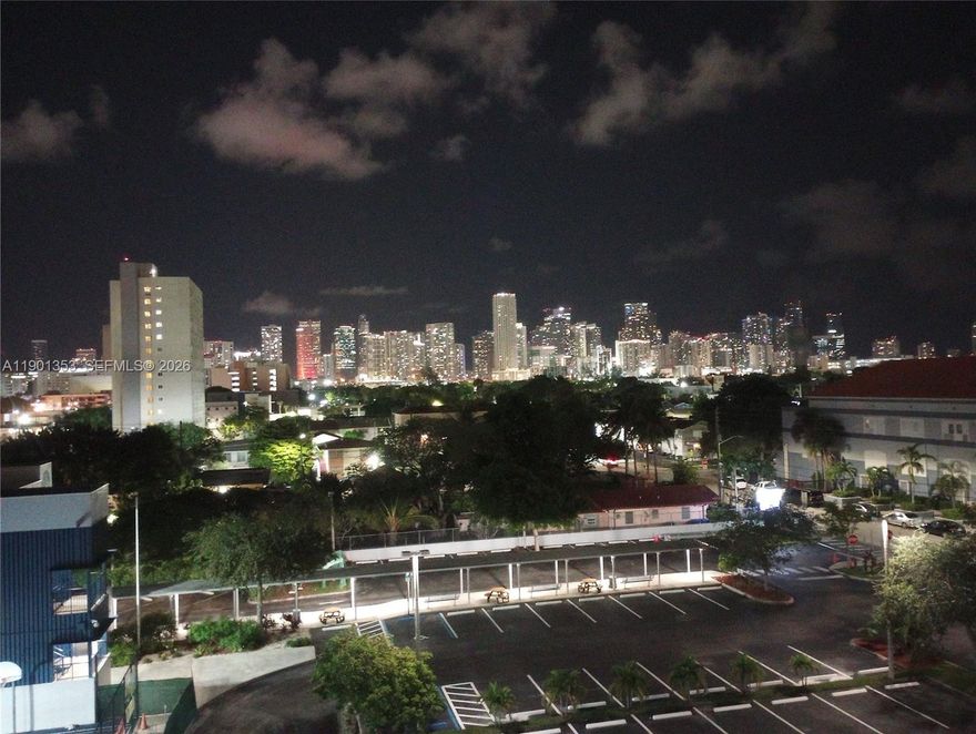 Top-Floor with Brickell Skyline Views in Little Havana, welcome to this pristinely kept 2-bedroom, 2-bath residence located just minutes from Coral Gables, Brickell and Downtown Miami. This bright top-floor unit offers stunning skyline views and a thoughtful layout with modern upgrades throughout. Enjoy the convenience of a brand-new washer and dryer, new electric water heater, and new central A/C for year-round comfort.The building features secure entry, camera surveillance, covered parking garage, and two elevators for easy access. Ideal for homeowners seeking a well-maintained property in a rapidly growing neighborhood. Move-in ready. 2 Year Rental Restriction.
