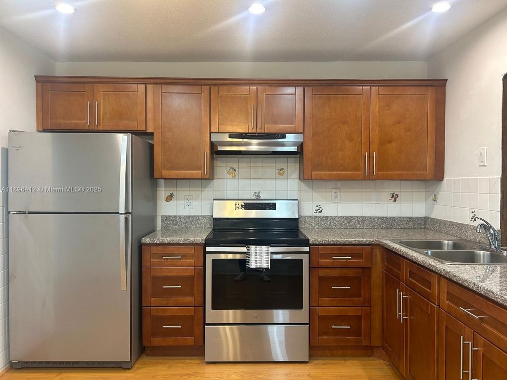 Photo of 4804 NW 50th Ct, Tamarac, FL 33319 (MLS # A11896412)