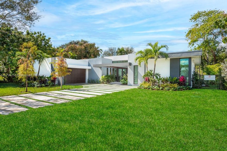 Experience luxury in this exceptional 2025-built single-family home, blending elegance, comfort & modern design. Featuring 5 spacious beds & 4 beautifully baths, this home showcases impeccable craftsmanship throughout. The open-concept living area boasts soaring ceilings and a gourmet chef’s kitchen outfitted with premium, high-end appliances—ideal for entertaining and everyday living. The primary suite offers a true retreat, 2 walk-in closets and a bath featuring dual vanities & a sleek glass-enclosed shower. Step outside to a private oasis with a sparkling pool & covered patio. The landscaped front yard includes a driveway & an attached 2-car garage. Includes hurricane-impact windows & a dedicated laundry room. Developer fee 1.5%. Located near top-rated schools and shopping areas.