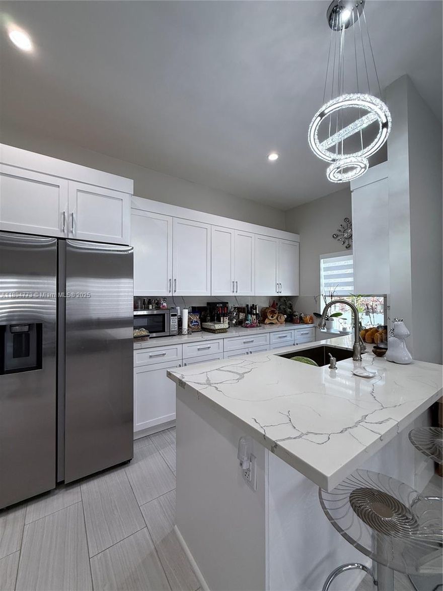 Step into comfort and style with this beautiful 1-bedroom, 1-bath efficiency, perfect for singles, couples, or professionals seeking a modern and low-maintenance living space. Located in a peaceful residential neighborhood, this home offers a bright open-concept layout with high ceilings, recessed lighting and plenty of natural light.