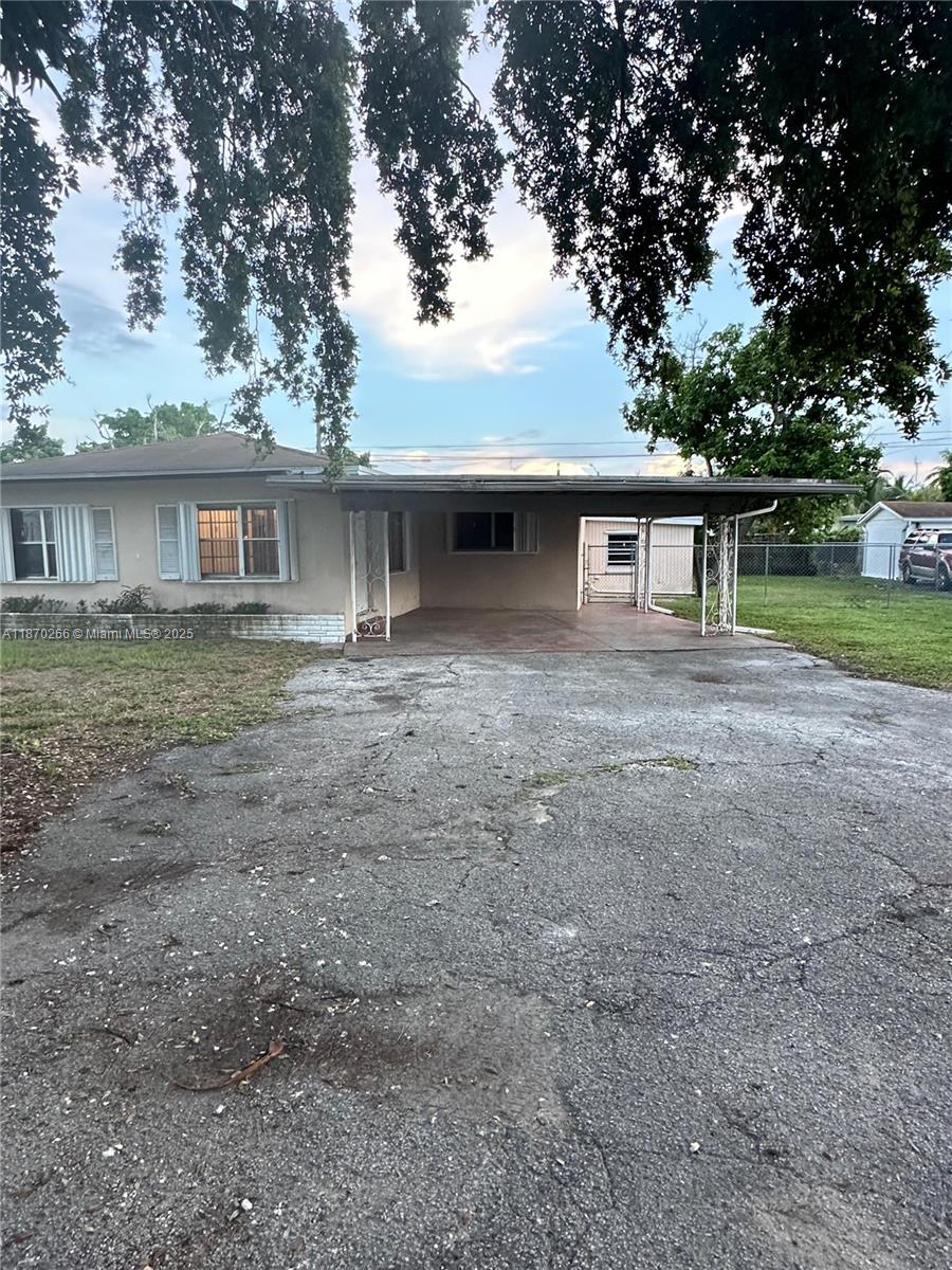 3-bedroom, 2-bathroom single-family home which includes 1-bedroom, 1-bathroom space featuring a separate entrance—potential for guest quarters or rental income. Home needs some updating. Large backyard offers space for expansion, pool installation, or secure parking for RV/boat behind fence. Property has flexible use potential.