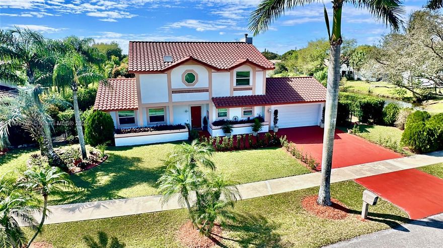 Stunning lakefront, pool home on 11,540 square foot lot, minutes away from multi-million dollar ranches! This home features 3 bedrooms/2.5 baths, a family room w/ brick fireplace, a living room, a formal dining room, and eat-in kitchen with granite countertops, stainless steel appliances, and pantry. Oversized backyard with privacy hedges, screened patio, pool and spa, perfect for entertaining, barbeques, and watching breathtaking lake views! The huge main bedroom has 2 walk-in closets, a main bathroom w/ Roman tub, separate shower enclosure, and skylight. Hurricane Impact windows and roof installed 2018, dual AC units, and laundry room. A rated schools, parks, shopping/restaurants, and expressways nearby. Property has been updated and is sold "As is" with right to inspect. Owner Agent.