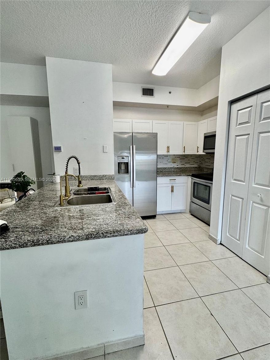 Beautiful 2 bed /2 bath unit in the heart of Doral! This well-maintained residence features a bright and functional layout, a fully renovated kitchen with stainless steel appliances, updated bathrooms, and a water filtration system for added comfort. Located in a secure and well-kept community with an unbeatable location offering easy access to major highways, top-rated schools, shopping, and dining. Property is move-in ready and will be delivered freshly painted. Don’t miss this opportunity! Easy to show.