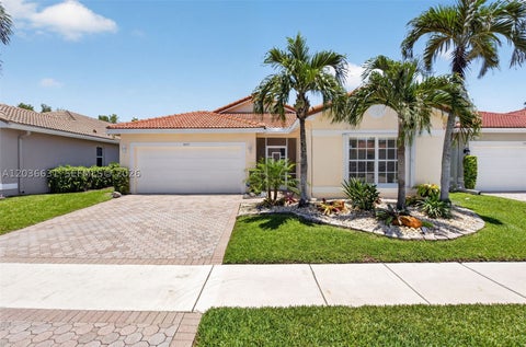 Photo of 7679 Lemonwood St, Boynton Beach, FL 33437 (MLS # A12036631)
