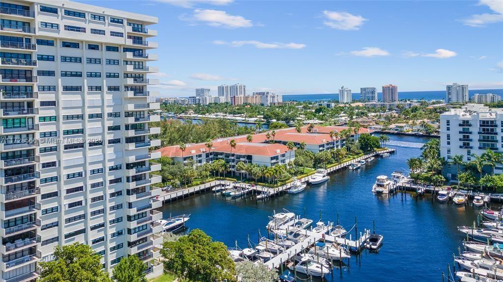 Incredible Opportunity at The Tower at Port Royale! This spacious 10th-floor unit offers stunning harbor and ocean views from its private balcony and features granite countertops, stainless steel appliances, new Maytag microwave and dishwasher, and a Washer/Dryer in-unit. Enjoy the convenience of 24-hour security, covered parking, and luxurious amenities including a heated pool, tennis courts, well-equipped gym, and a pavilion with gas grills. Water, cable, and Wi-Fi are included. Just minutes from the beach, restaurants, Publix, and Imperial Point Medical Center, this community offers dock space with ocean access. Rent immediately with a minimum 90-day lease—perfect for investors or year-round living. Schedule with Showing Time today to see why this is a once-in-a-lifetime opportunity!