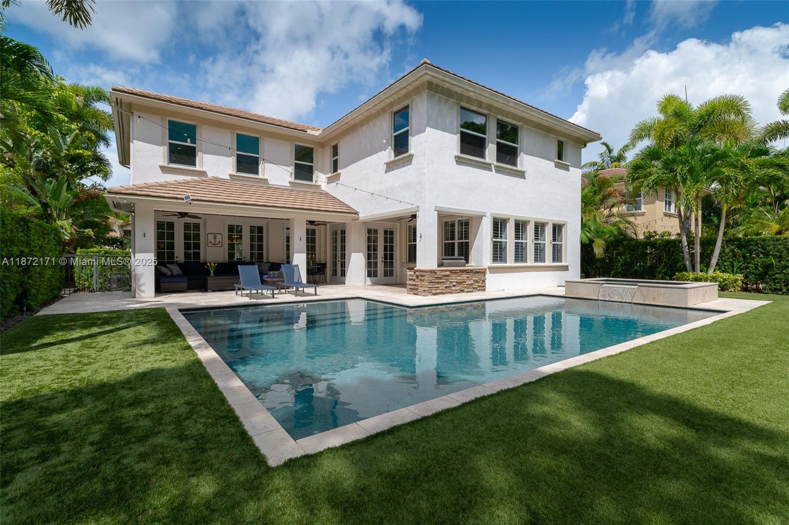 Exceptional and rare, this Elliston model offers 5 BD and 4.5 BT overlooking the preserve. Inside, soaring ceilings, abundant natural light, and an expansive loft create a bright, open layout. A sweeping curved staircase makes a striking architectural statement.
The chef’s kitchen is appointed with granite counters, a brand-new Fulgor Milano gas range, double ovens, stainless steel appliances, and a custom pantry. Wood flooring flows throughout the main living areas and bedrooms, while the primary suite features marble floors, granite counters, and a spacious walk-in closet.
Outdoors, the private preserve setting creates a serene retreat with a resort-style pool and spa, extended brick patio, and a built-in gas grill for effortless entertaining.