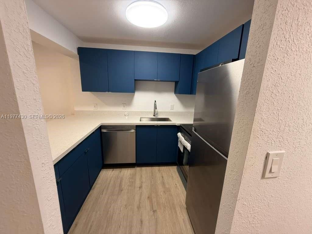 Photo of 5911 Washington St #103, Hollywood, FL 33023 (MLS # A11977430)