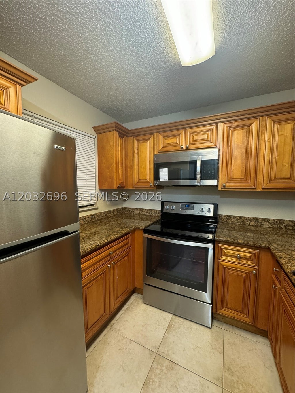 Photo of 1640 Windorah Way #D, West Palm Beach, FL 33411 (MLS # A12032696)