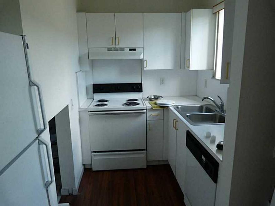 Two-level condo apartment - Laminated wood floor - Central AC - Dishwasher - Washer / Dryer - Right next to Dophin & Palmetto Expwys - Only First and Security - One parking space assigned. 1 pet max. 25lbs. Water is not included in the rent.