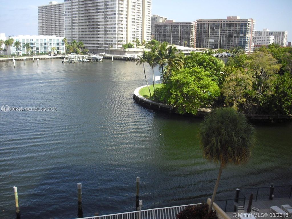 Photo of 121 Golden Isles Dr #407, Hallandale Beach, FL 33009 (MLS # A11960245)