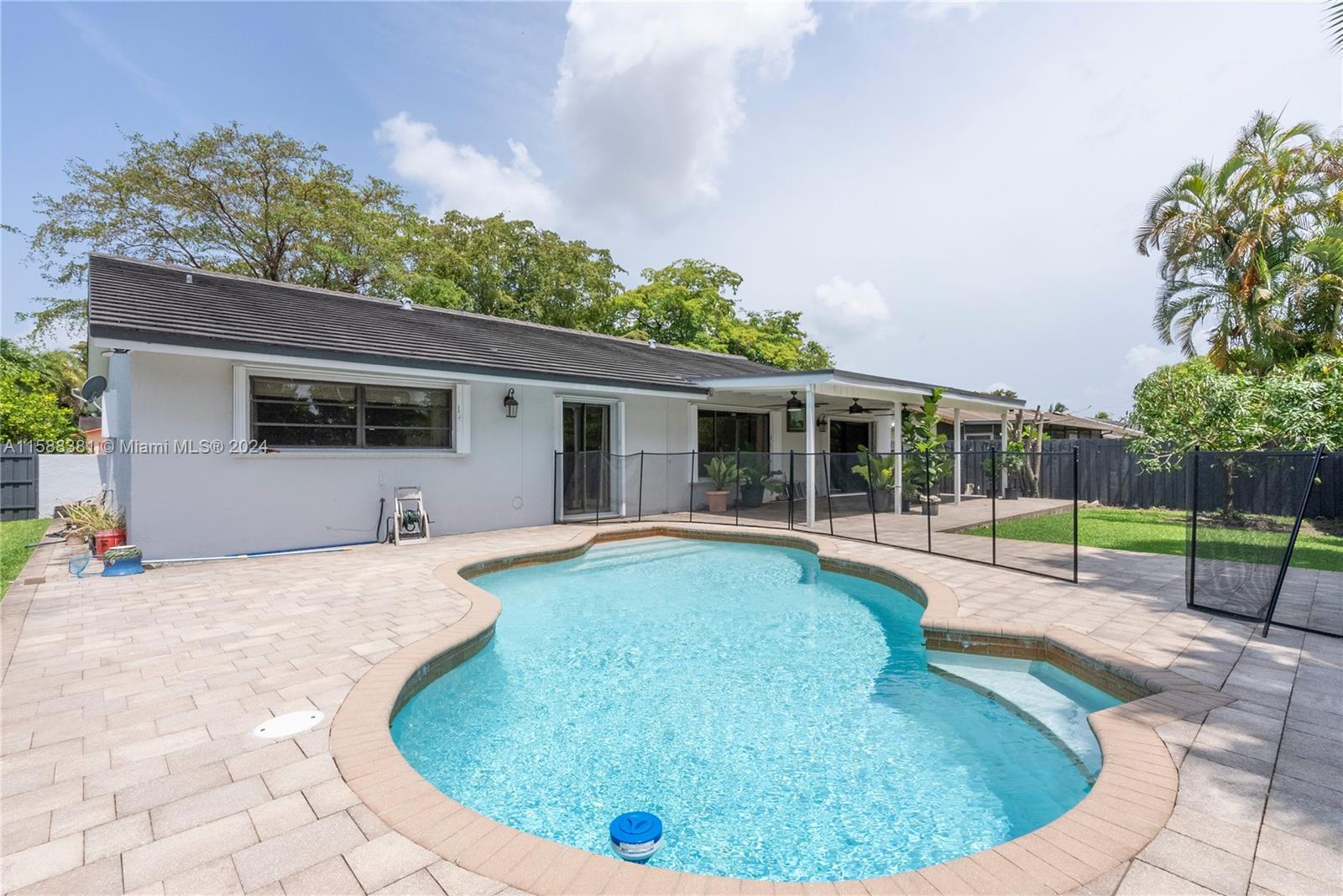 Beautiful Spacious 4/2 single family POOL HOME Awaits!! This coveted home in the heart of Kendall offers Volume ceilings,  ceramic tile throughout, updated kitchen and bathrooms, full accordion shutters, double car garage, large pool with nice front and back porch. Grade A++ schools, airports, restaurant, shopping , main highways all near by. Just bring your luggage and move in, enjoy the peace and tranquility this home has to offer. Pets welcome, some restrictions may apply.