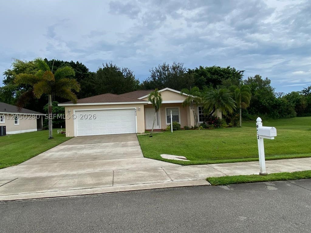 Photo of 6432 Las Palmas Way, Port St Lucie, FL 34952 (MLS # A12050280)