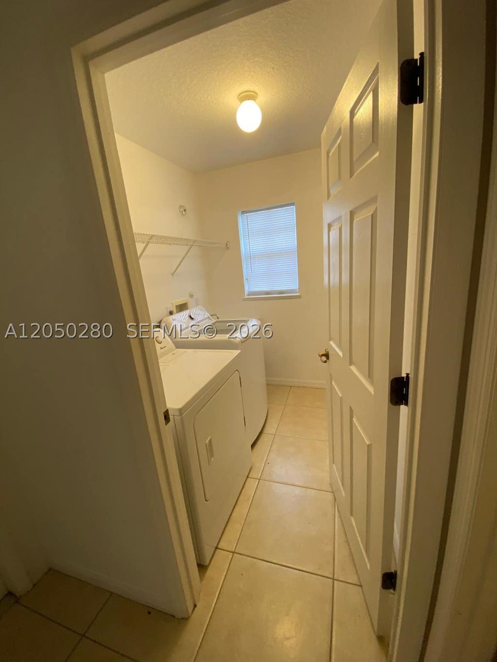 Photo of 6432 Las Palmas Way, Port St Lucie, FL 34952 (MLS # A12050280)