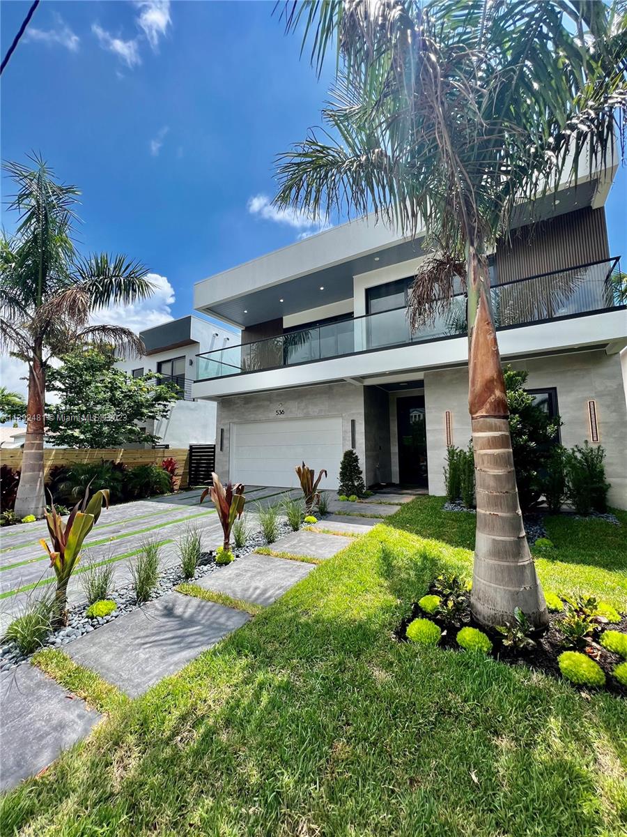 536 Ne 8th Ave Fort Lauderdale. This beautiful modern home boasts 3,501 SQFT under air and features 4 large bedrooms + a full Glass office and 4 full bathrooms. Throughout the home, there are large format porcelain tiles and a 15x40 state of art heated pool with a hot tub. Outstanding High-end finishes throughout the home, Speakers located in the main area of the home as well as the master bedroom, outdoor deck area, and glass office/den. This home is also pre-wired for "smart home" features. This property is located in the heart of FORT LAUDERDALE's Victoria Park, 1.5 miles from the beach, and 3 minutes from Los Olas 'strip' which contains plenty of restaurants and boutiques! The perfect location!