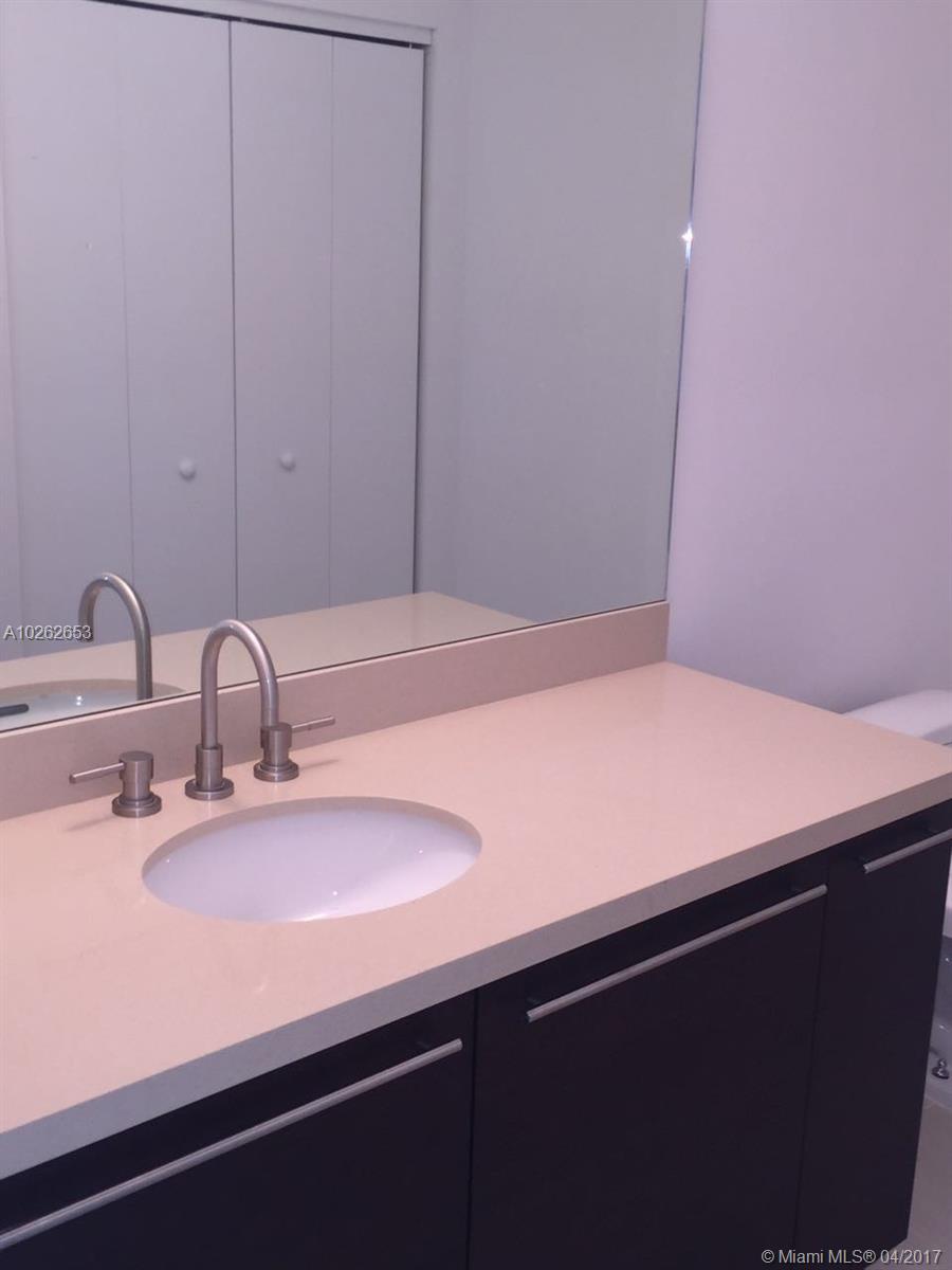 ELOQUENCE ON THE BAY COND - Residential Lease