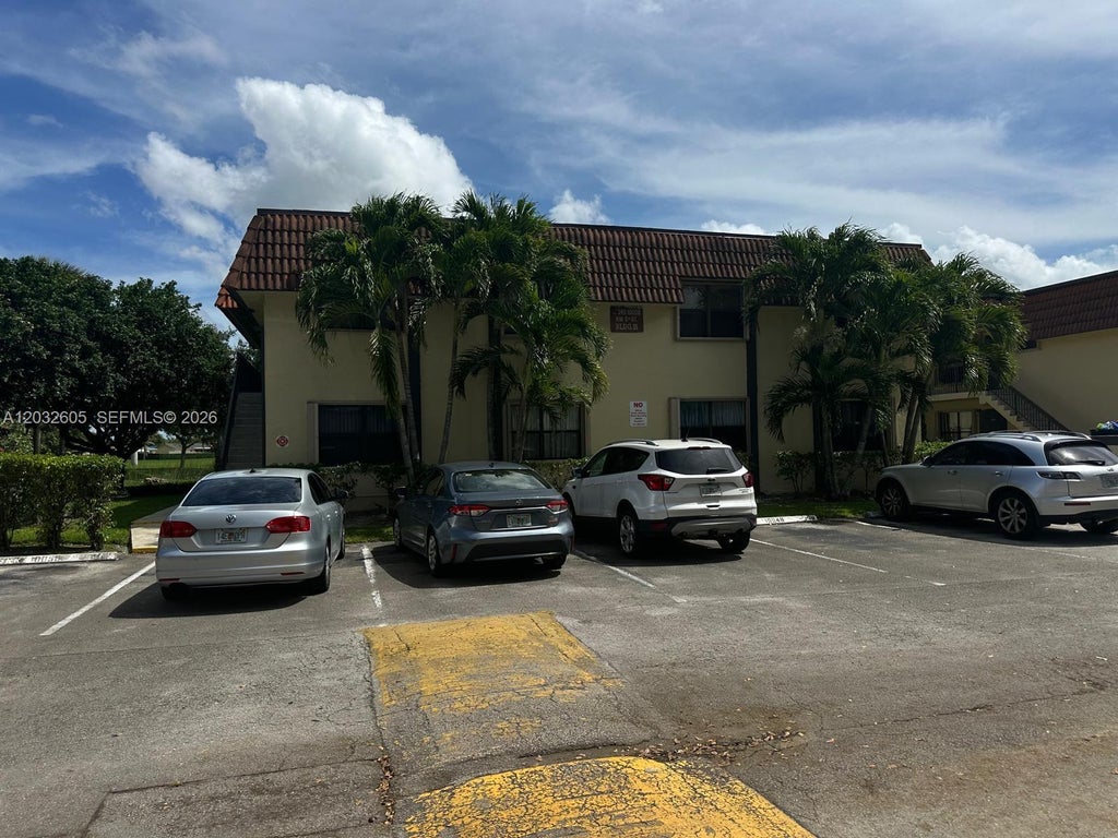 Photo of 10050 NW 6th St #202, Pembroke Pines, FL 33024 (MLS # A12032605)