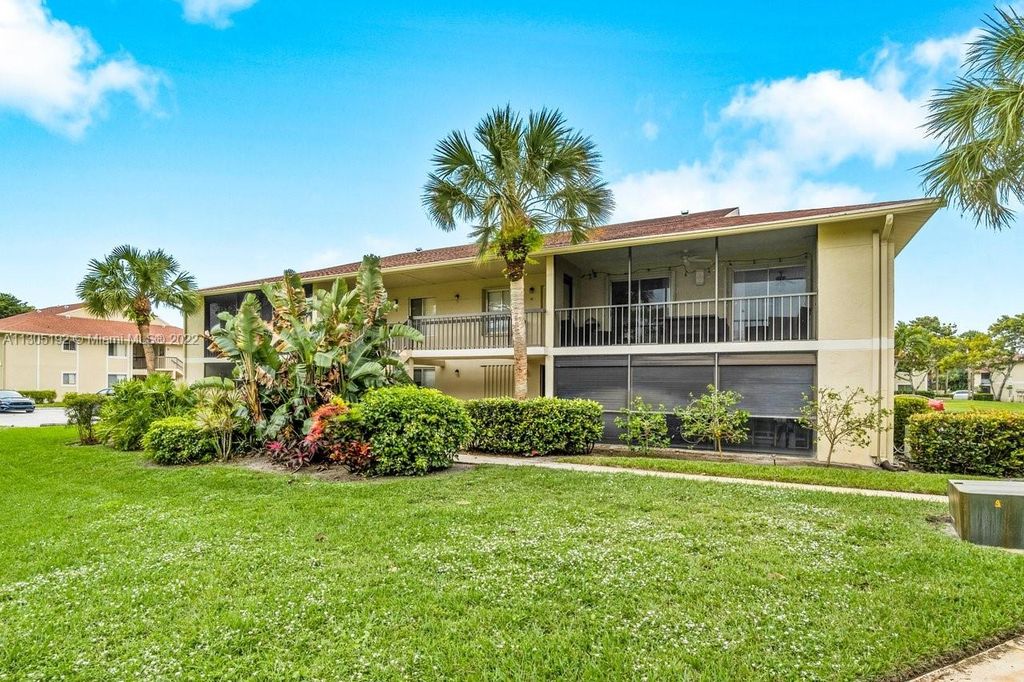 Photo of 6535 Chasewood Dr #H, Jupiter, FL 33458 (MLS # A11305192)