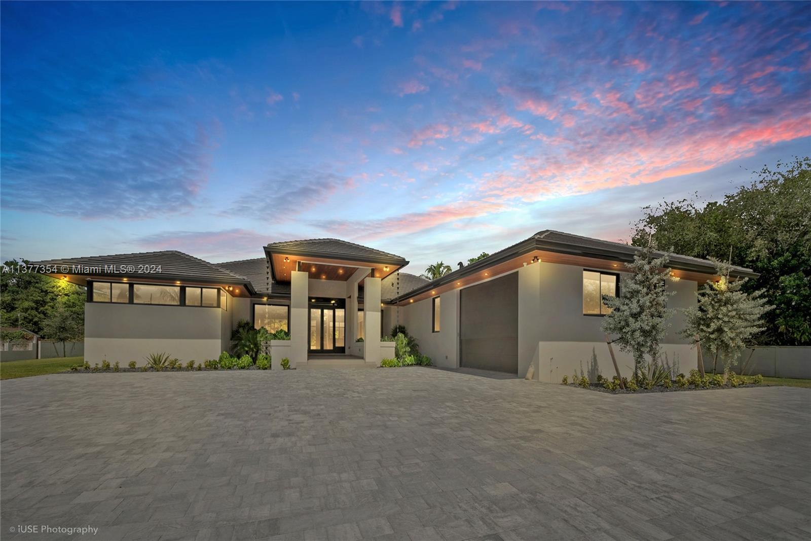 This luxurious brand-new home is situated in prestigious horse country and boasts over an acre of land with a lot size of 48,787 square feet. You can relax or entertain in the spacious and secluded garden, which features a gazebo complete with an outdoor kitchen and a full bathroom. The pool area is equally impressive, with an oversized and pristine 20 X 50 pool. Step inside this dream home and enjoy the luxurious living spaces with five bedrooms and seven bathrooms. The kitchen is a chef's dream, featuring SS Genair appliances with quartz stone countertops. This smart home includes surround sound, security cameras, and an alarm system for added convenience and security. The property has an oversized paved driveway and includes private gated remote entry.Owner Financing Available.