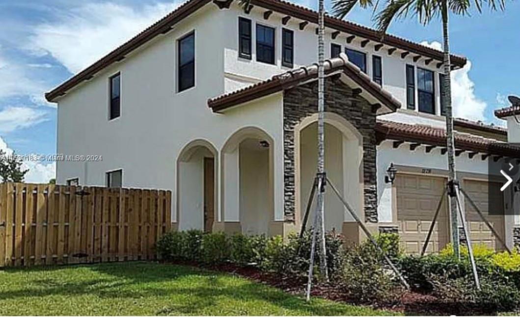 Property with the largest yard than other properties in the area , 5 bedroom , 2.5 bathroom , garage for two cars , master bathroom with tub and shower, large pantry .