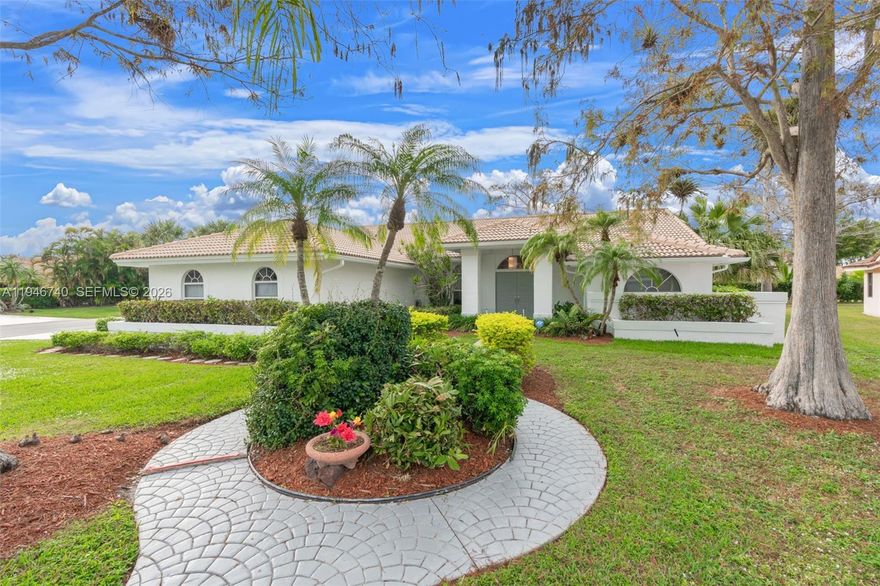 WELCOME HOME to this beautiful 3-BEDROOM, 2-BATHROOM home situated on an oversized corner lot in the highly desirable Woodmont golf community in TAMARAC. This home features a sought-after split floor plan, providing added privacy with the primary suite on one side that includes two walk-in closets. The primary bathroom is spacious with a separate tub and shower, with dual sinks. The kitchen and family room combination creates a warm, open space perfect for everyday living and entertaining. The living room offers a spacious open area with vaulted ceilings that add volume and natural light throughout.

Enjoy the South Florida lifestyle with a screened-in pool, ideal for year-round relaxation, along with a dedicated laundry room for added convenience. Freshly painted on the exterior and equipped with a brand-new garage door opener, this home is move-in ready while offering endless potential to make it your own dream home.

Located in an established neighborhood with a low HOA and close to shopping, restaurants, and more. Optional golf and social memberships are available at Woodmont Country Club. Don’t miss this opportunity—schedule your showing today before it’s gone!