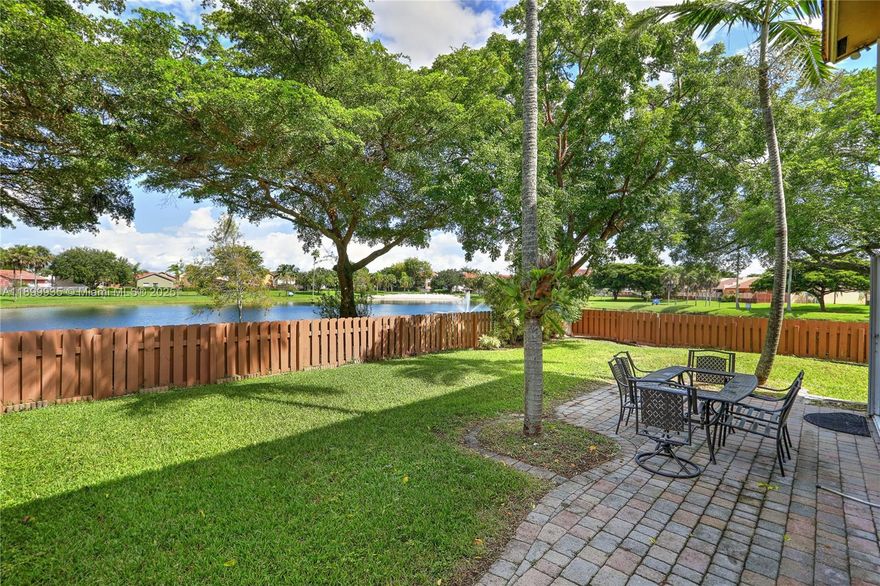 Rare opportunity to own a private corner single family lake front home with a larger than normal lot (6,900 sq ft) for the community including a good-sized backyard tucked away and with direct access to the Hammocks lake and walking trails. This well maintained 3 bed 2.5 bath with 1,777 sq ft features a 1 car gar garage, a large and private driveway entrance, formal living, family and dining rooms, accordion shutters, and a large kitchen with pantry and granite counters to go with your newer stainless-steel appliances. A perfect home and a perfect community for all families! Step out into the Lakeside at the Hammocks walking/jogging trail directly from your backyard and enjoy the views and beach! Great school zone. Easy to show.
