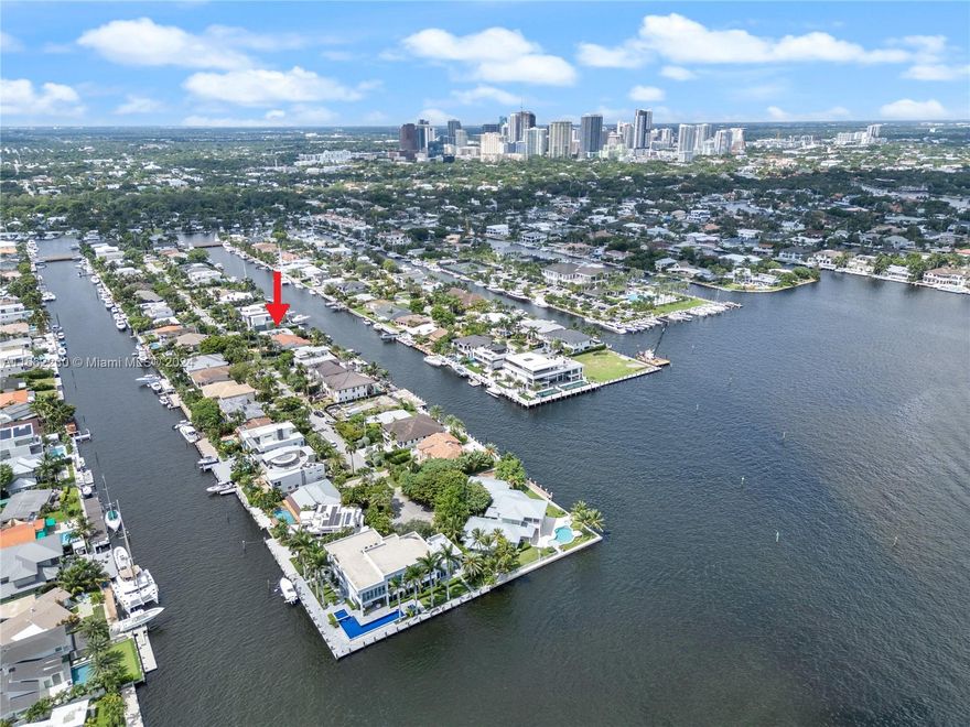 Rare development opportunity to build your dream home in highly desirable Lauderdale Harbors! Just 600' from the Intracoastal, this 70' x 110' lot can accommodate up to a 60' boat and is on one of the widest canals in Ft. Lauderdale (150') with no fixed bridges and just 5 minutes to Port Everglades and the ocean. Existing home features 2 bedrooms plus 10' x 20' den/office, 2 full baths, spacious waterfront living room, dining room, 2 covered decks overlooking the waterway and more. Features include new central A/C in 2023, new shingle roof in 2023, resurfaced flat roof in 2021, new dishwasher and refrigerator in 2024, wood burning fireplace & more.  Minutes to Fort Lauderdale Yacht Club, Las Olas/downtown, beaches, airport, Brightline and all major roads.