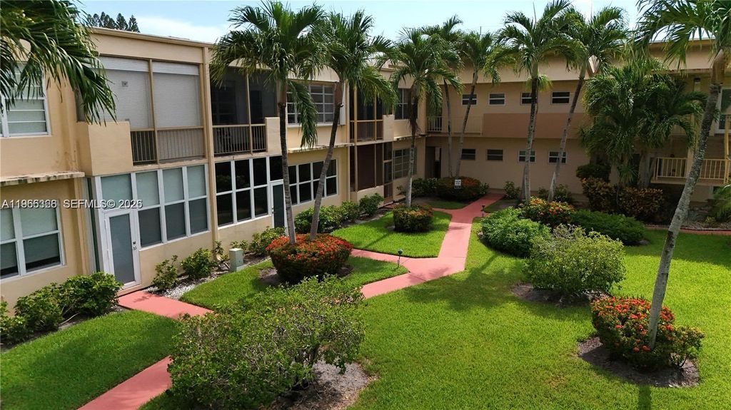 Photo of 851 NE 14th Ave #414, Hallandale Beach, FL 33009 (MLS # A11966366)