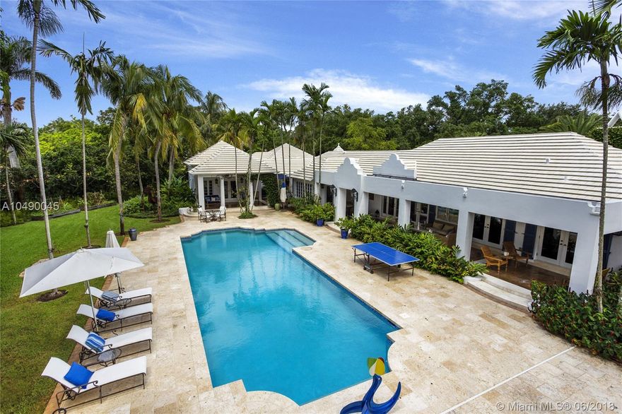 Exquisite home located in the private and guard-gated Snapper Creek Lakes neighborhood. The 6- bedroom, 6.5 bathroom residence features custom built –in and high-end designer finishes. Upon entry one is greeted by a spectacular foyer and voluminous ceilings. Situated on a 1.4 acre lot, the masterfully designed home features a guest house and grand entertainment areas.