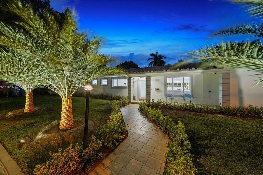 MUST SEE! If you're looking for one of the largest Biscayne Park 4-bedroom pool homes available, check this out (Bitcoin accepted)! Beautifully updated 4 bed-3.5 bath midcentury pool home ~3,000 SF of interiors on a large 11,585 SF lot. Great open flow plan, three living areas, dining room, and eat-in open island kitchen, plush multiple lush entertainment gardens. Four spacious bedrooms (two ensuites) including primary with majestic spa-like double-vanity bath, freestanding tub, and a massive shower with 16 power jets and dual rainfall shower heads. Great features: impact windows-doors, private powder room, huge 20’x40’ pool, multiple patios, mini golf, and outdoor moonlight movie screen. You’ll feel like you’re living in “paradise” in this dreamy Biscayne Park tropical resort-style home!
