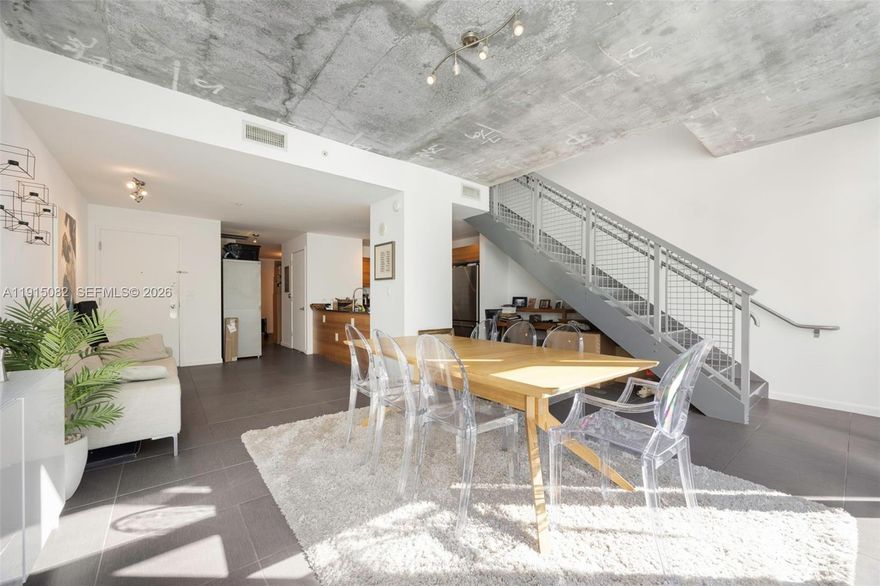 One of the largest residences in Four Midtown—this exceptional two-story 2BD/2BA loft spans 1,613 SF, offering space rarely found in the neighborhood. Perfectly blending modern design with functional living, this unique layout features a lower level with the kitchen, dining area, and a flexible, large second bedroom/den ideal for overnight guests or a home office, along with a full bath.

The expansive upper level is devoted to the master suite, complete with en suite bath, walk-in closet, and industrial-inspired elements, creating a modern retreat. Floor-to-ceiling windows on each level fill the space with natural light. Stainless steel appliances, modern finishes, and a balcony complete this turnkey residence.

This residence is perfect for buyers who seeking space and value, in a modern loft setting. It's a rare opportunity to own a residence of this size at a price point typically reserved for much smaller condos. 

Four Midtown residents enjoy premium amenities including a state-of-the-art fitness center, resort-style pool, jacuzzi, BBQ, and 24-hour concierge service. Centrally located between Wynwood and the Miami Design District, Four Midtown sits across from the future Midtown Park site, a recently approved $2B master plan set to reshape the neighborhood. Being sold partially furnished.