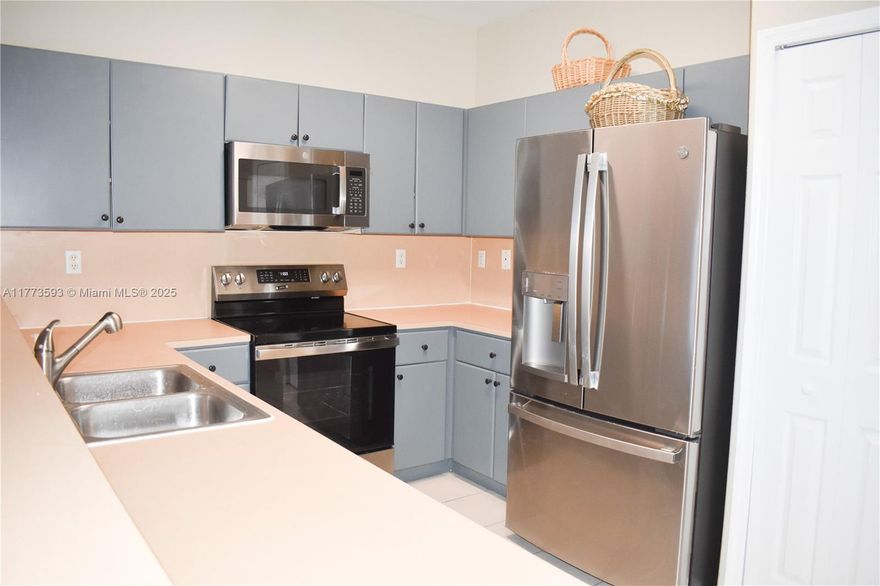 Discover the perfect blend of style and functionality in this beautifully maintained 2-bedroom townhouse featuring private baths, a third room, a den, or office, and an additional bathroom, all located in the heart of Kendall, Miami. Featuring updated appliances with modern finishes and spacious bedrooms with ample closet space, this home offers comfort and convenience at every turn. Enjoy the privacy of a full bedroom and bath on the main floor—ideal for guests or a home office. The property also includes a private patio with no back neighbors, perfect for outdoor dining or relaxation. Conveniently situated near top-rated schools, shopping, dining, and major highways, this townhouse is move-in ready.