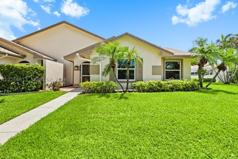 Photo of 9370 Boca Gardens Pkwy #D, Boca Raton, FL 33496 (MLS # A12066613)