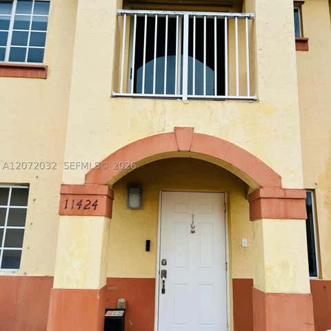 Photo of 11424 NW 94th Pl #7, Hialeah Gardens, FL 33018 (MLS # A12072032)