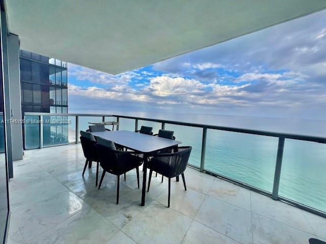 Live at most prestigious Jade Ocean, right on the beach of trendiest Sunny Isles. This unit's perfect floorpan features exceptional master bedroom with walk in closet and most spacious and beautiful master bathroom; calacata marble floors throughout, and state of the art kitchen equipment. Convenient den converted into second bedroom and private laundry room. Huge terrace with breathtaking views of the ocean invite to enjoy privileged beach services, sunrise and sunset impressive pools, 2 hot tubs, excellent spa plus one of the best equipped gym rooms in the real estate market . Concierge service, day restaurant and more