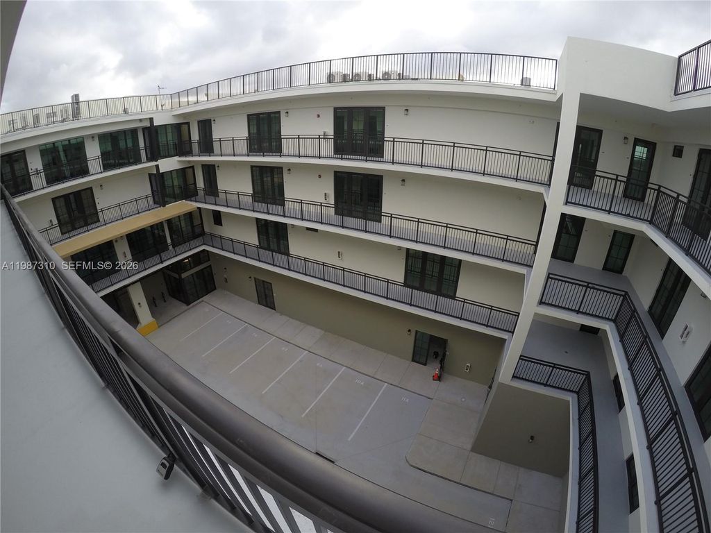 Photo of 4100 SW 64th Ave #409, Davie, FL 33314 (MLS # A11987310)