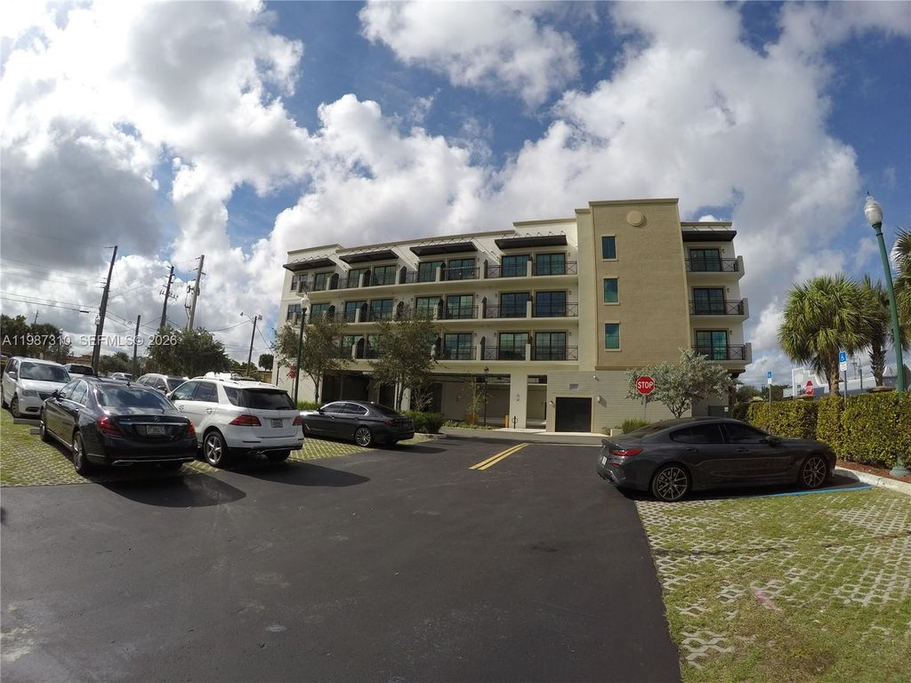 Photo of 4100 SW 64th Ave #409, Davie, FL 33314 (MLS # A11987310)