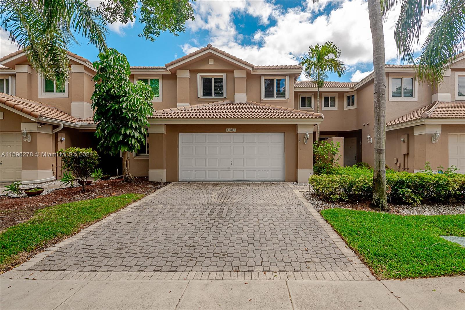 Waterfront Townhouse in the Grand Palms Golf and Country Club. Updated kitchen with granite counter tops and SS appliances. First floor has spacious Living Room with high ceilings, Formal Dining, Family Room, Half Bathroom, 
Laundry Closet, and two Car Garage.  Second floor has three Bedrooms, Walking Closets and two Bathrooms. 
No Carpets! tiled first floor and laminated second floor. Accordion Shutters throughout the unit. HOA approval needed up to 2 weeks. Excellent School district and a great location close to I-75 entrance from Pines Blvd and a second gate on Pembroke Rd. Near Costco, Whole Foods, Pembroke Gardens, Restaurants and other Malls.
Easy to show!