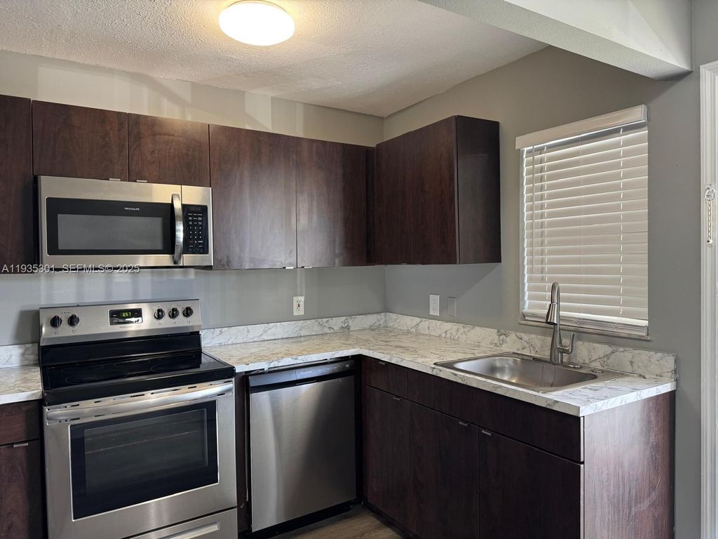 Photo of 617 Ixoria Ave #19, Fort Pierce, FL 34982 (MLS # A11935301)