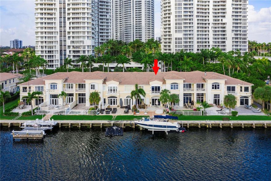 Intracoastal Front Courtyard Home at the Point of Aventura!  This residence is located in the prestigious gated Aventura Waterways community.  It offers  5-bedrooms and 6.5-baths, and is the largest model available, offering 3,600 sq. ft. of interior space, these rarely come onto the market. Enjoy breathtaking direct Intracoastal views from the expansive master suite, which features a renovated spa-like bath. There is also an updated Kitchen and separate guest house with a full bath.  The private boat dock includes a brand-new lift for up to 25,000 lbs. 

Residents enjoy resort-style amenities, including a world-class spa, three pools, and walkable access to upscale shops, cafés, and houses of worship. A rare opportunity for luxury waterfront living in an exclusive setting.