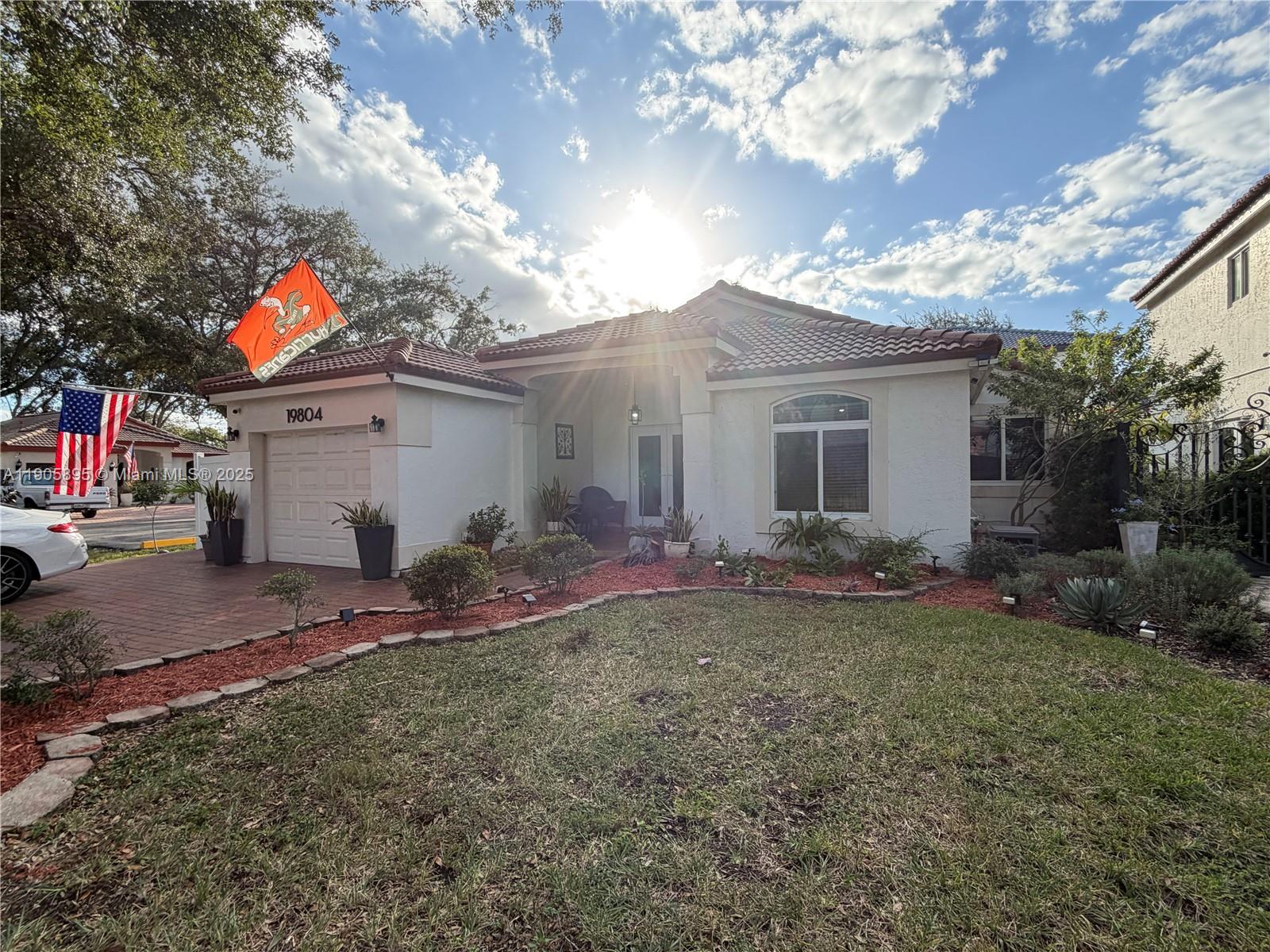 Welcome home! This Meticulously well-maintained 3 Bed 2 Bath home is nestled on a corner lot in the highly sought after gated community of Marbella Park. Centrally located to major Highways, Shopping, and Dining. Key features include; Natural Gas powered Kitchen Range, Dryer and Water Heater. California Closet in the Primary Closet, Porcelain Tile throughout, Fully updated Kitchen, Bathrooms, Impact Windows and Doors in addition to a Fully Paved Patio Yard. The extended insulated and well-lit terrace is ideal for family gatherings and entertaining. The Patio is fully secured with PVC fencing. The home is conveniently located next to guest parking. The Low HOA dues include 24hr Gated security, Community Pool, and Lawn maintenance for the front of the house. Move-in ready and priced to sell.