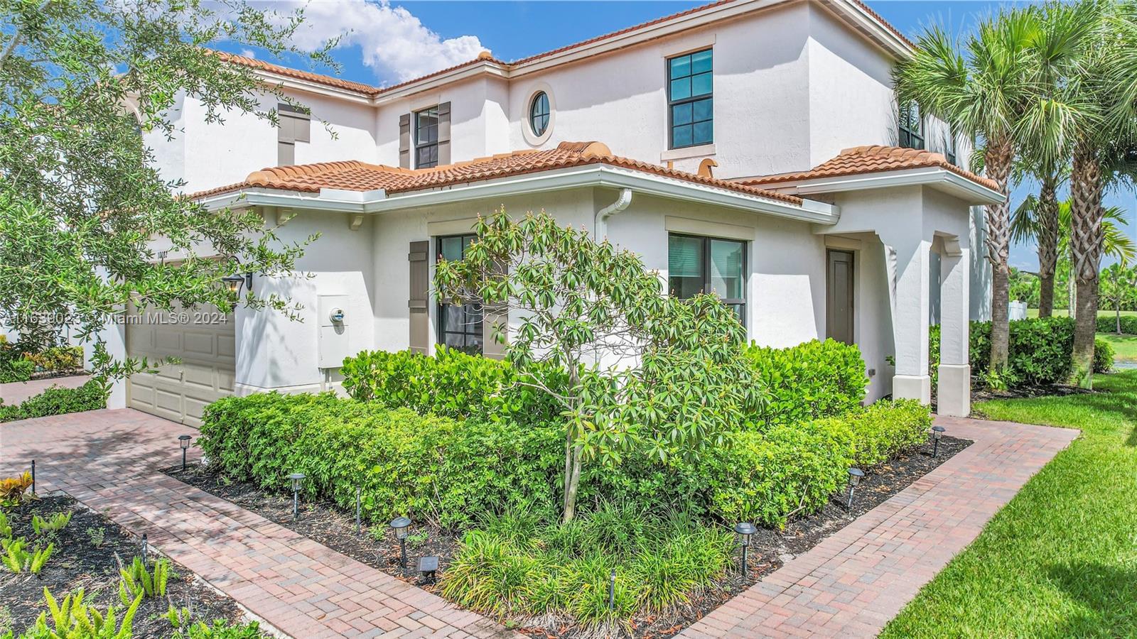Stunning Townhouse with lake and golf course view. This luxurious and modern property is located in the prestigious gated community of Enclave at Boca Dunes. The home features an open concept with integrated dining and living areas, with high ceilings. 3 bedrooms, plus bonus room and 2.5 bathrooms. Gorgeous gourmet kitchen, walk-in closets in every bedroom, main room with his and hers walk-in closets. Hurricane impact windows. LOW HOA. Two car garage, Oversized Driveway, A+ Schools. No weight restrictions for 2 pets. Great amenities included in the clubhouse. Pool, Spa, Fitness center, Playground, walking paths.
