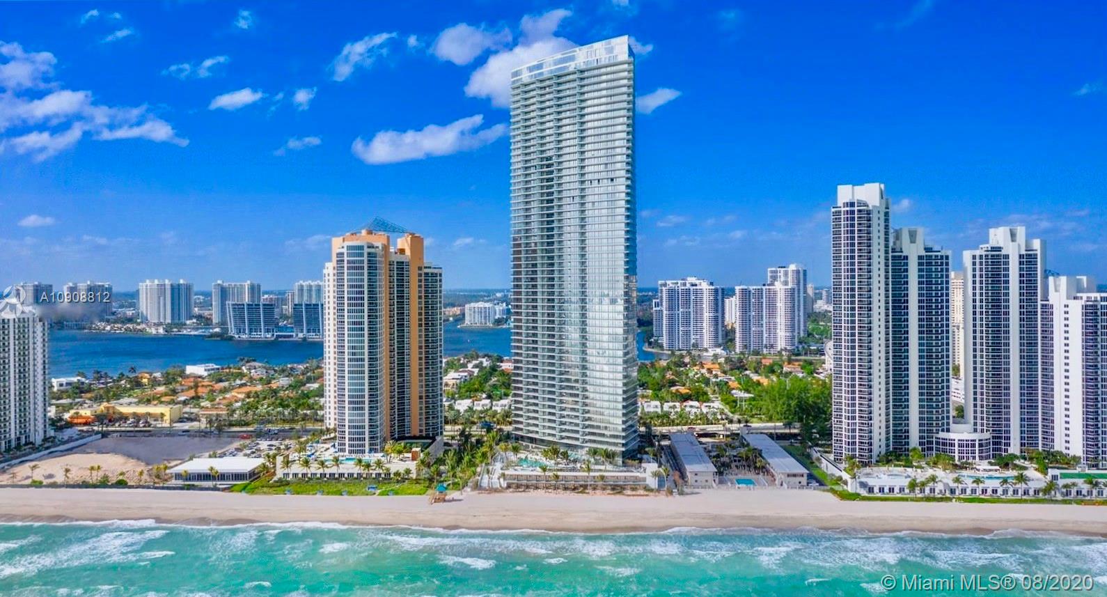 This magnificent tastefully finished flow through unit has breathtaking Ocean, City & Intracoastal Views. Unit features a private elevator that takes you to your 4 BDRM 5.5 BTH + Den With 3176 sq ft. Two Oversized terraces with a Summer Kitchen on the ocean side. Italian designed kitchen with sleek edges, imported stone countertops & backsplashes. Sub-Zero & Wolf appliances, 36x48 Gray Dove Marble throughout custom closets & electric blinds. Master Bathroom features Italian stone throughout with a spa shower. Armani has designed the building with flawless curves and state of the art theatre, game room, and gym. Experience the true pleasures at the spa, salon, restaurant, and lounge. 24 hr Security and Full beach service. Relax at the oceanside pool and bar.