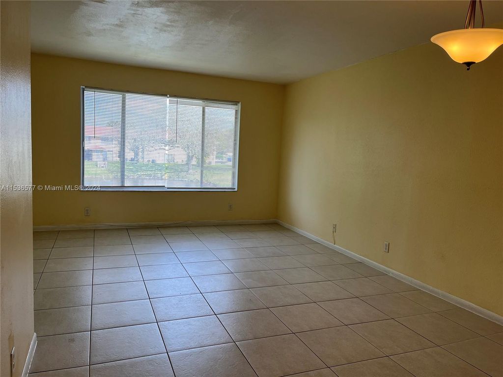 Photo of 9955 Twin Lakes Dr #9-K, Coral Springs, FL 33071 (MLS # A11536577)